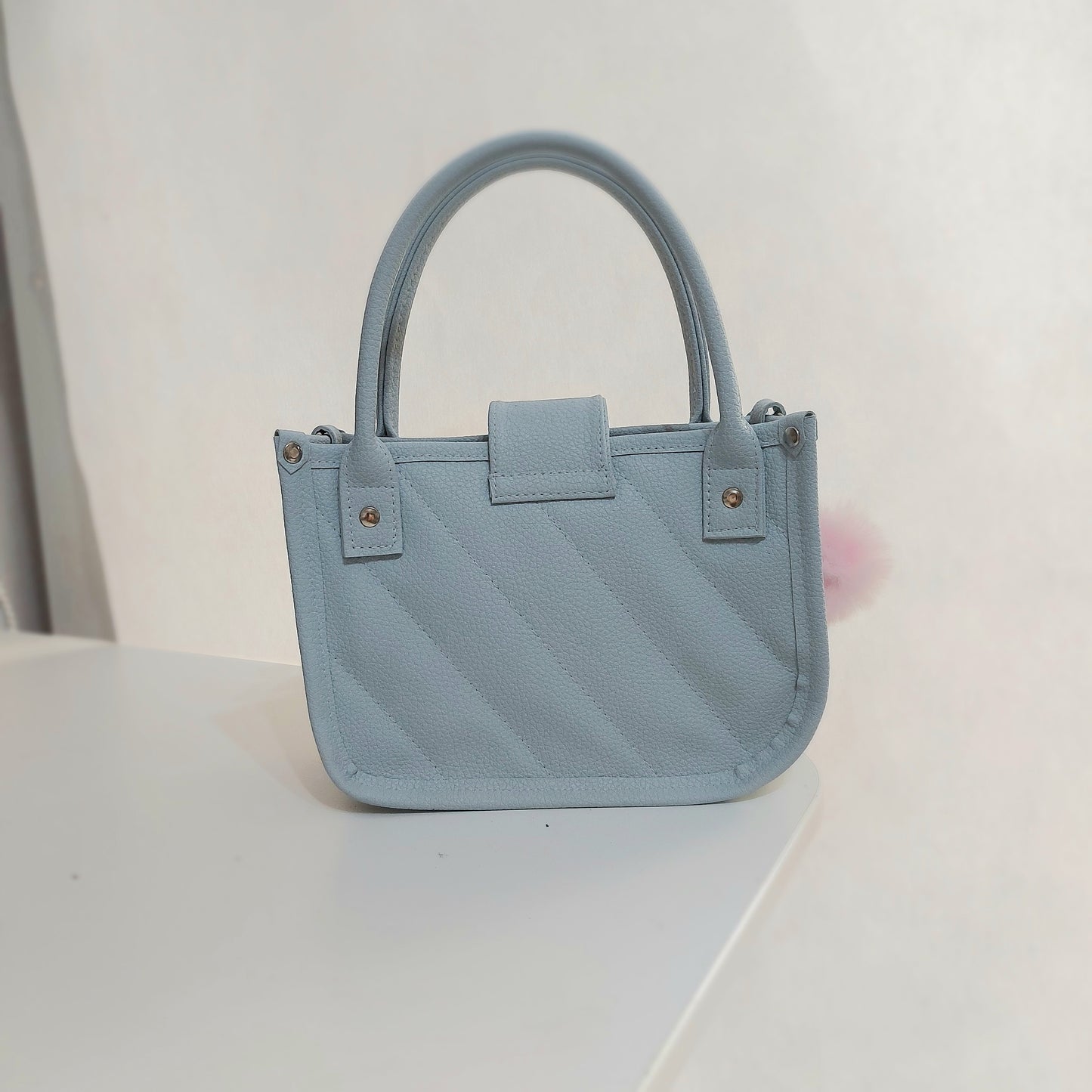 blue faux leather small essentials handbag and crossbody