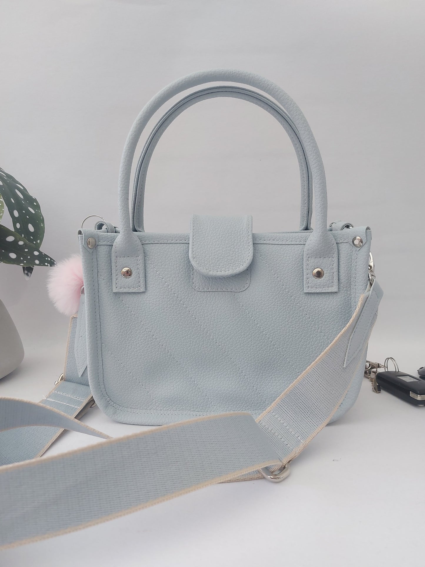 blue faux leather small essentials handbag and crossbody