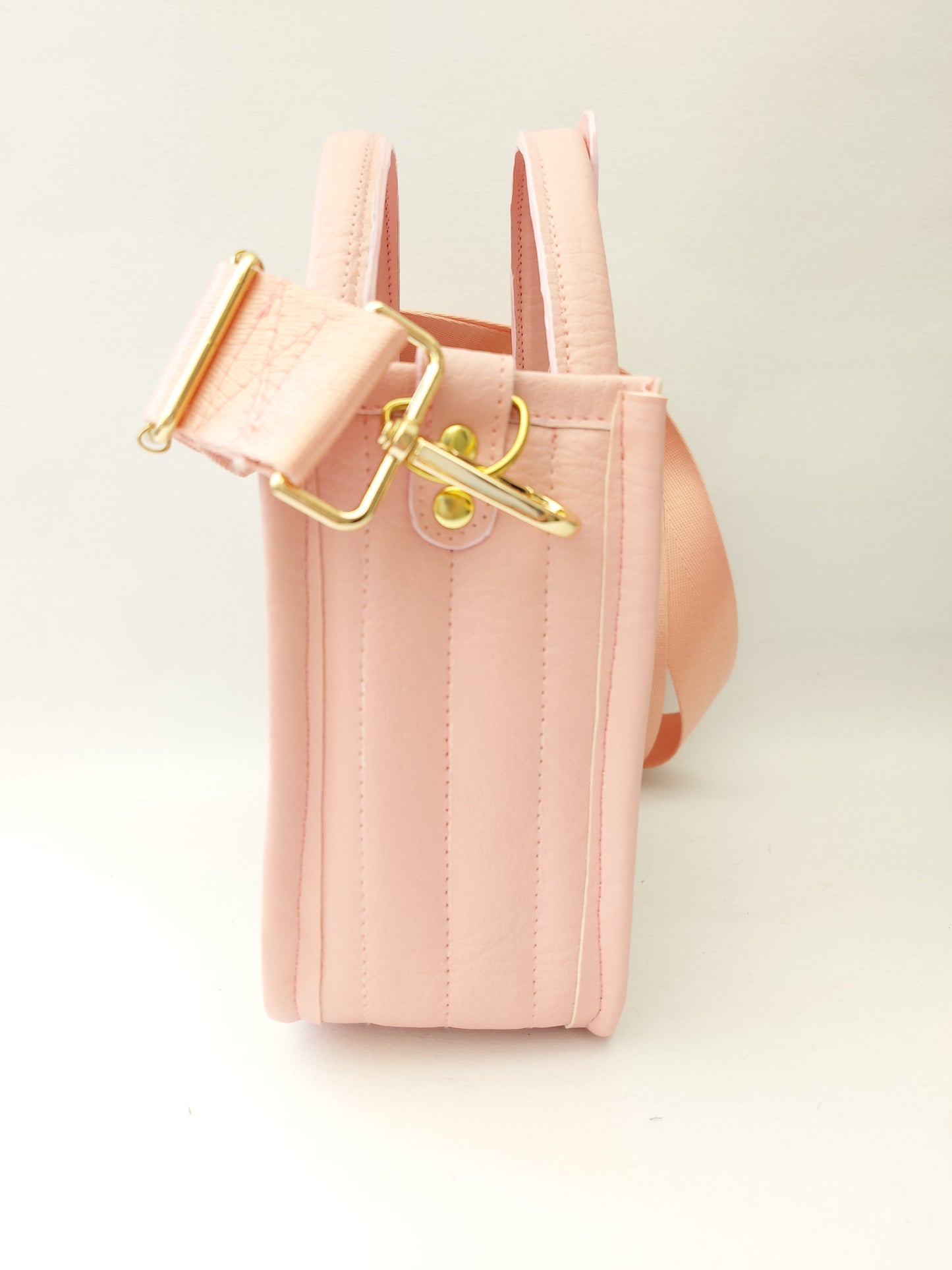 pink faux leather and floral small essentials handbag and crossbody