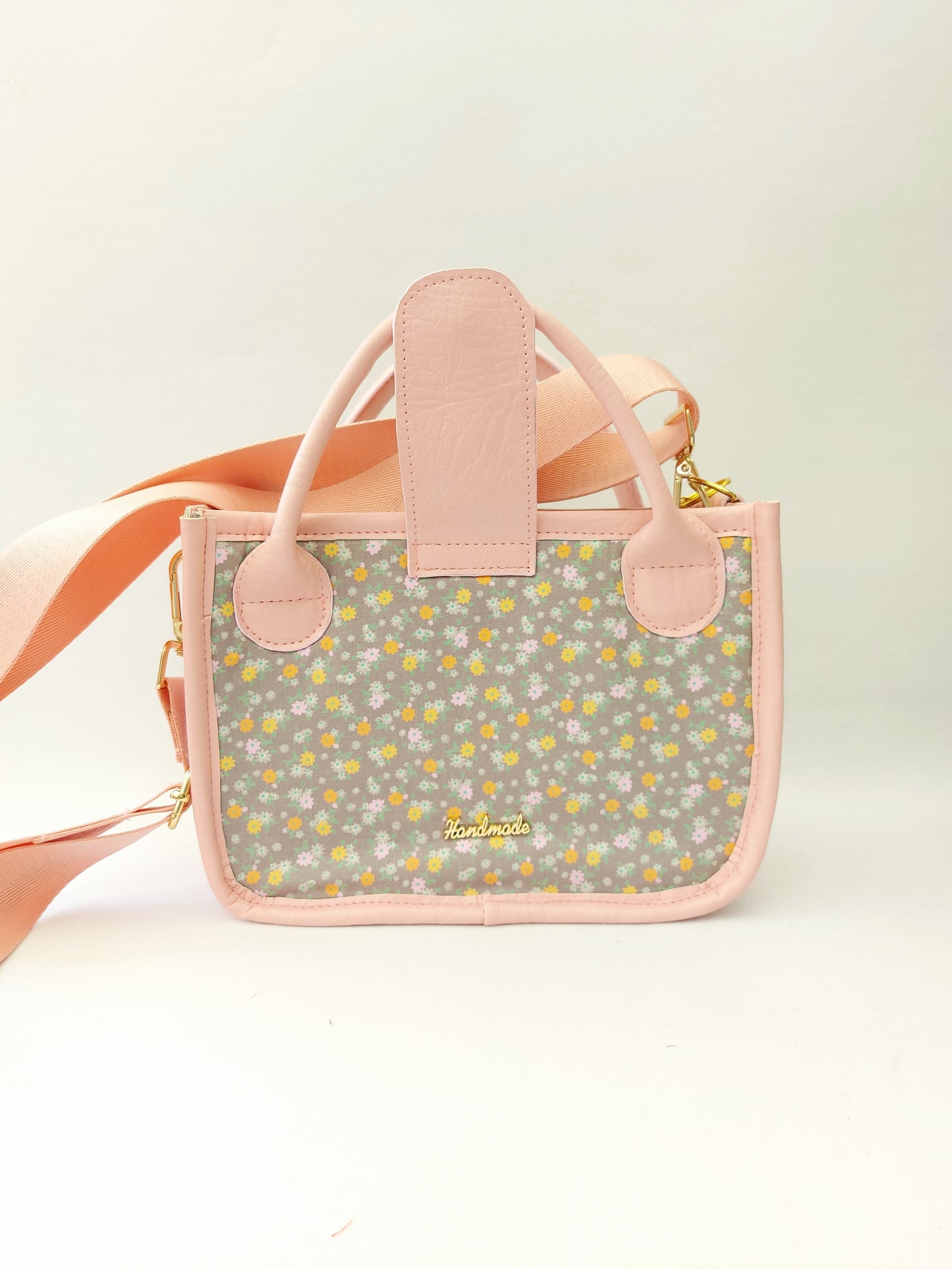 pink faux leather and floral small essentials handbag and crossbody