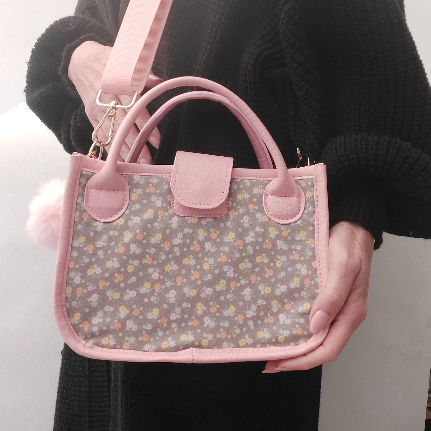 pink faux leather and floral small essentials handbag and crossbody