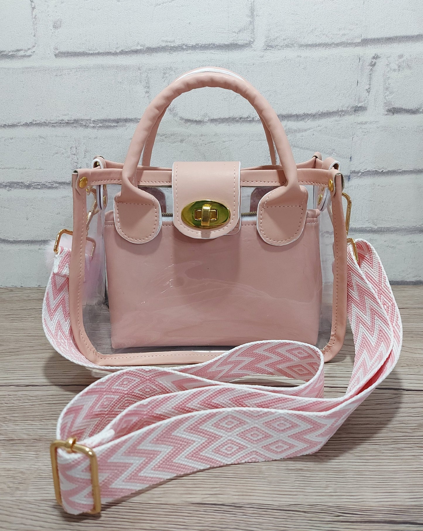 clear small bag with pink faux leather top handle and designer adjustable strap, days out nights out or work handbag, women and girls gift