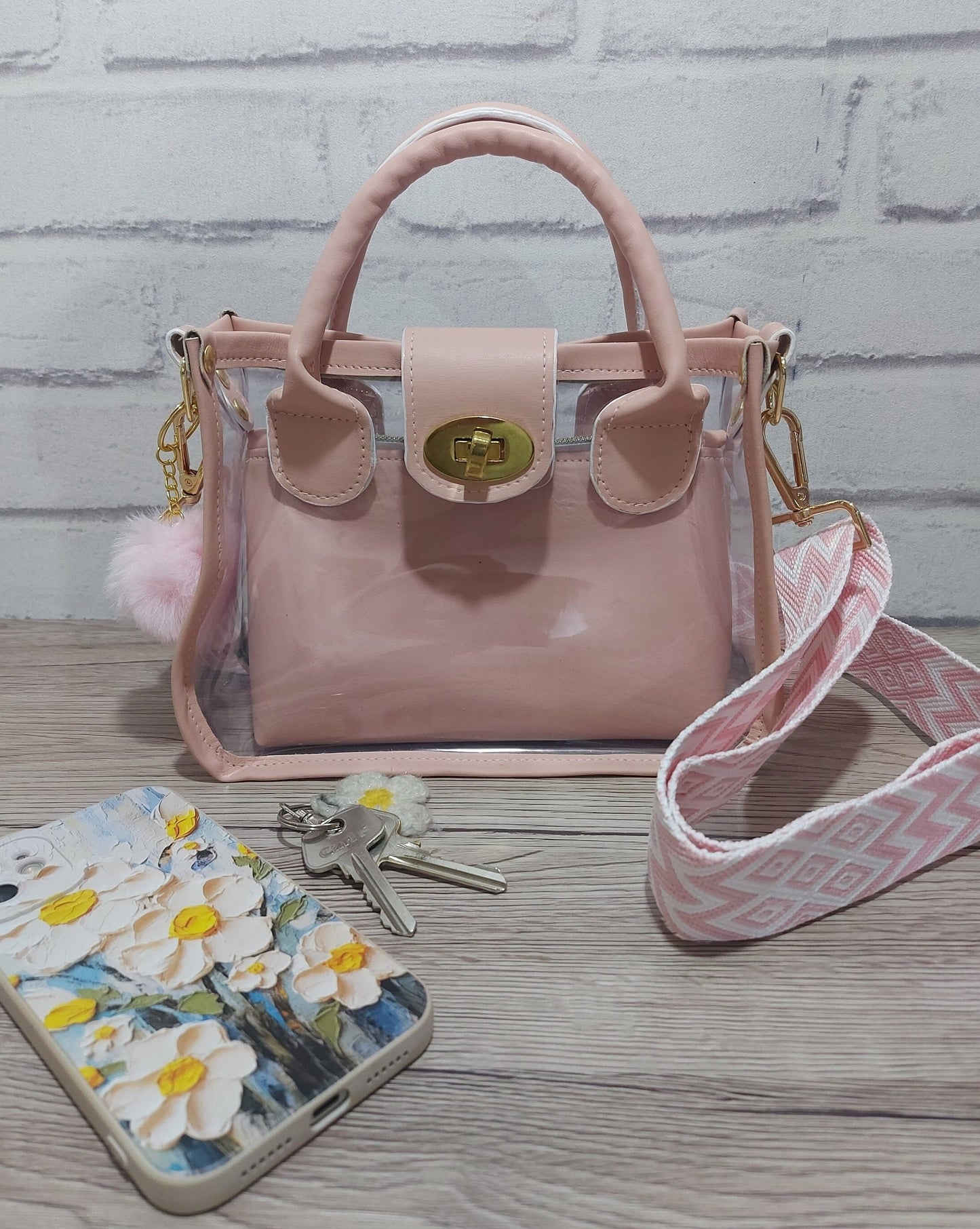 clear small bag with pink faux leather top handle and designer adjustable strap, days out nights out or work handbag, women and girls gift