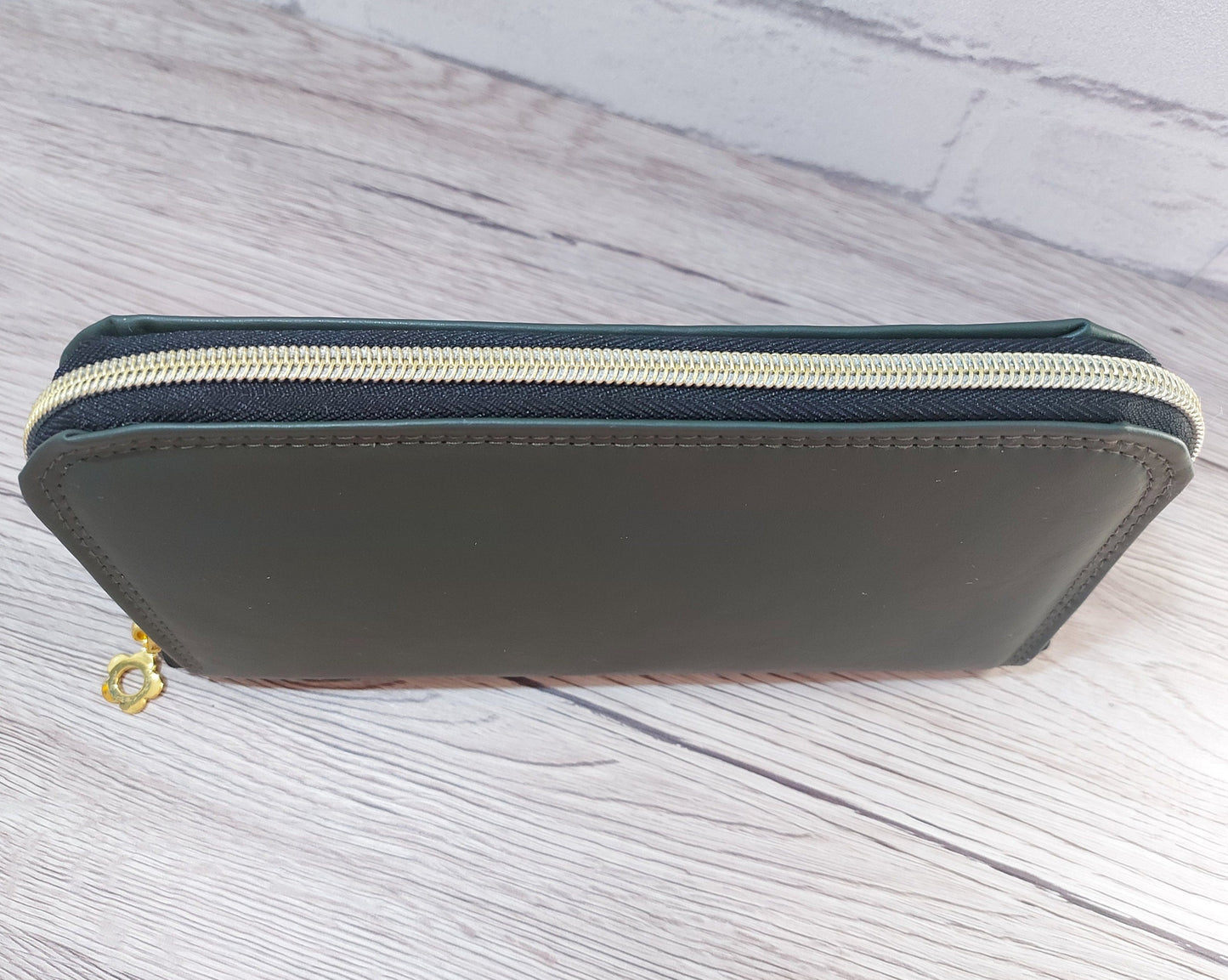 forest green faux leather large zip around women's wallet purse with card and cash slots and a zippered coin pouch, carry clutch