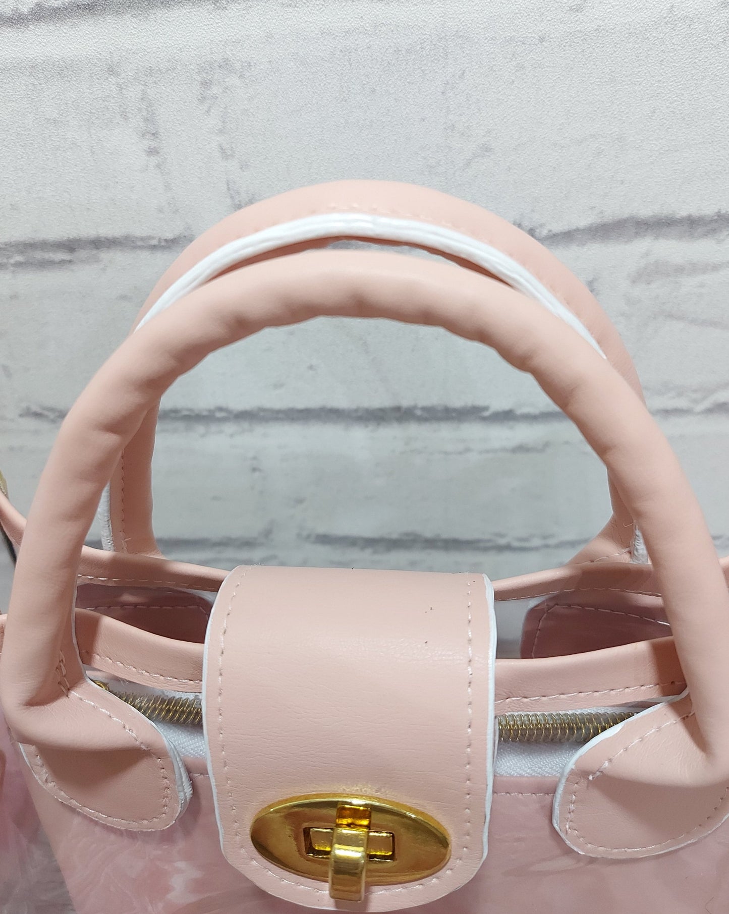 clear small bag with pink faux leather top handle and designer adjustable strap, days out nights out or work handbag, women and girls gift